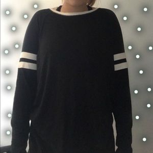 black sweater with white stripes